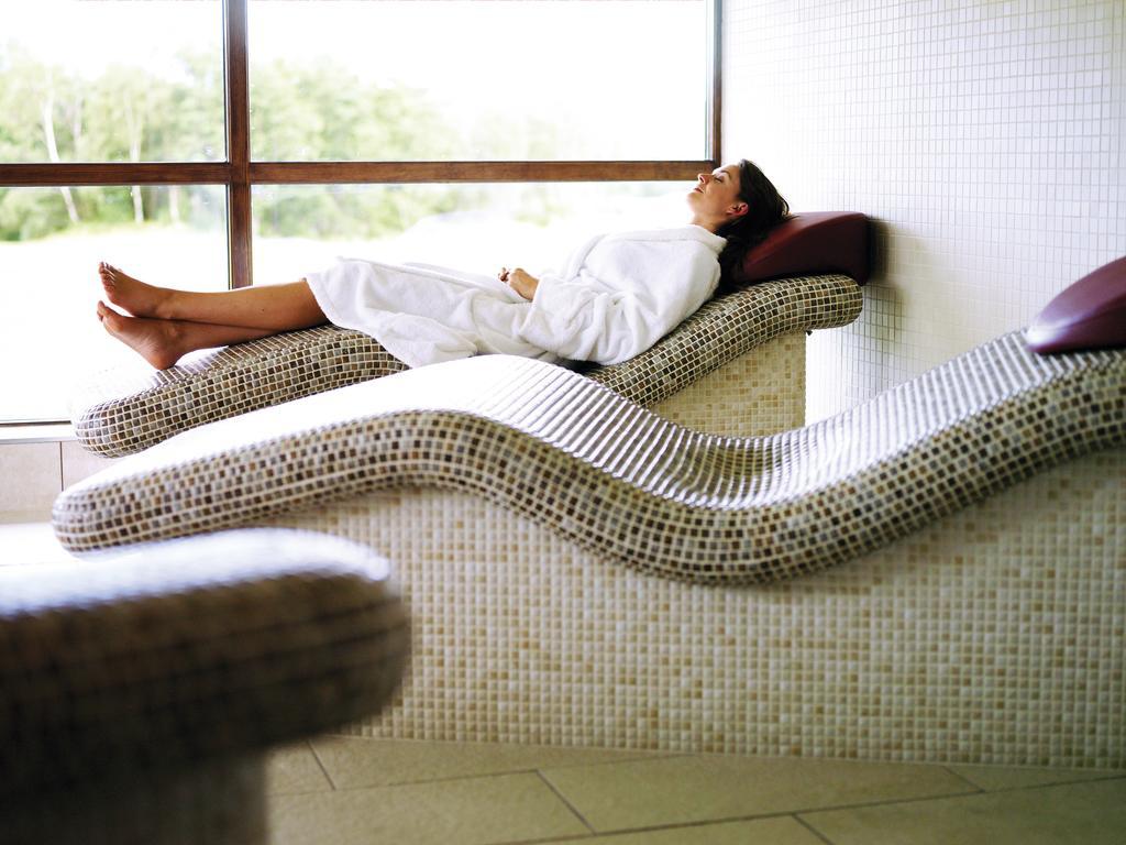 Cameron House on Loch Lomond Alexandria Exteriör bild A woman relaxing on a spa bed